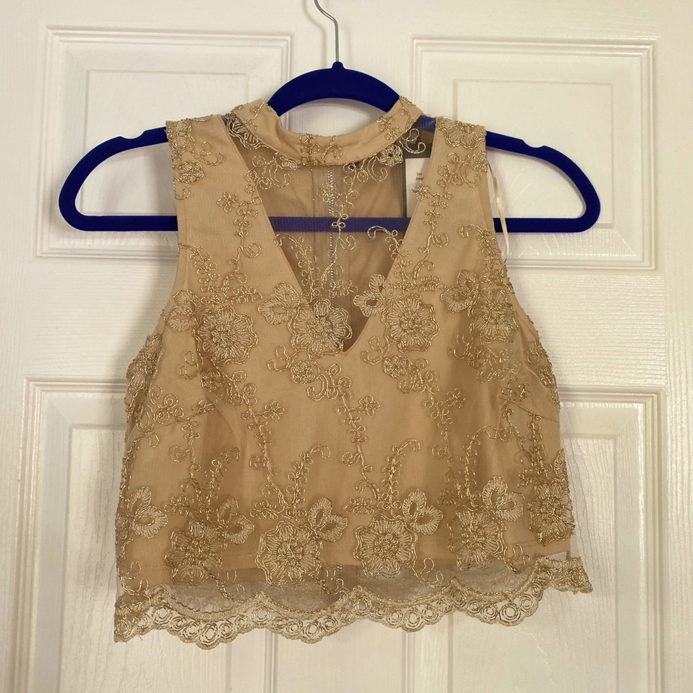 Gold flower design on crop top